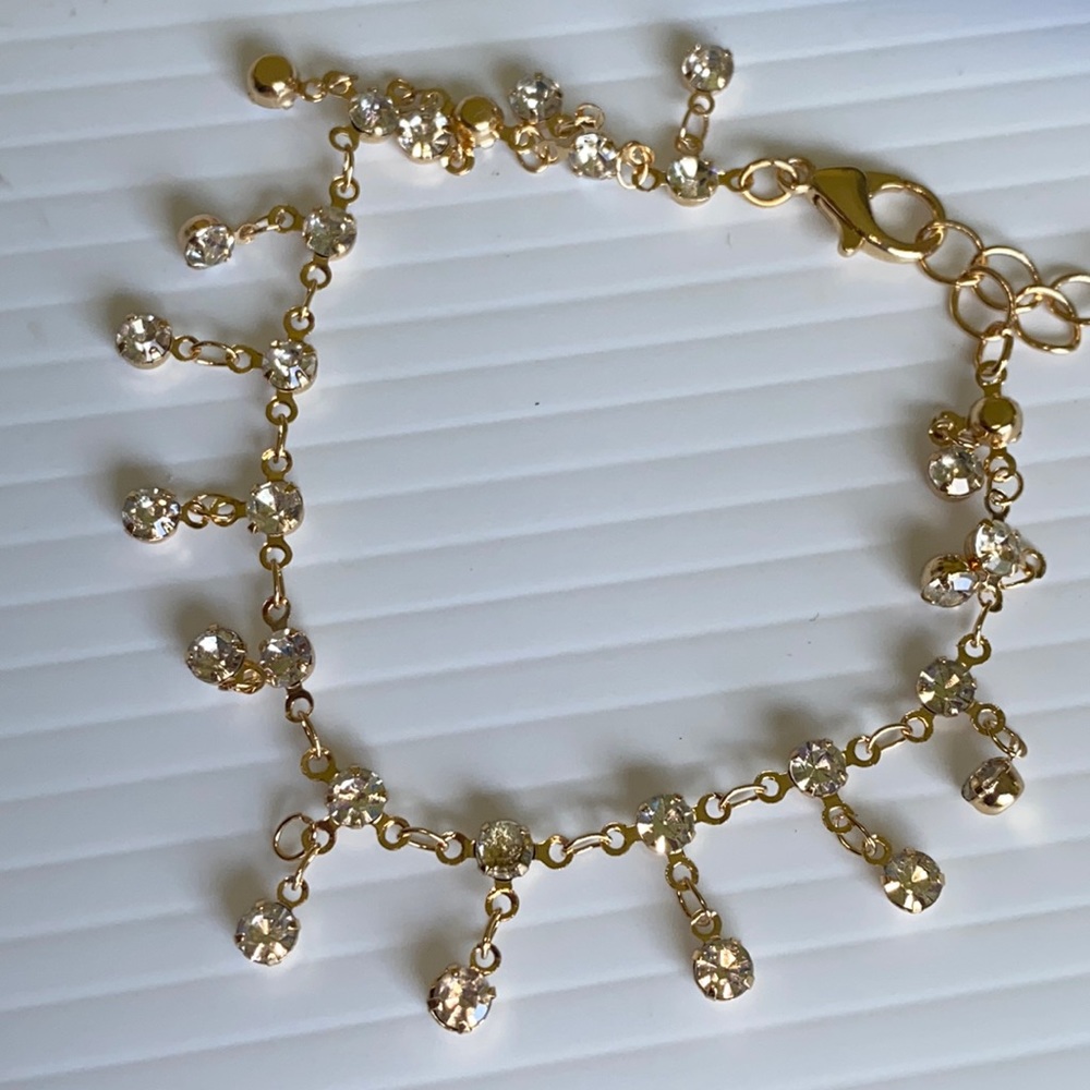 Kensie gold tone bracelet.